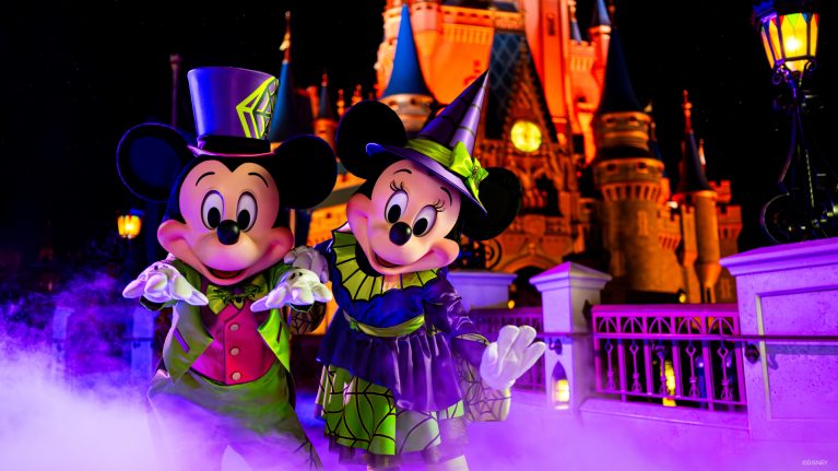 Mickey and Minnie in Halloween costumes at Magic Kingdom