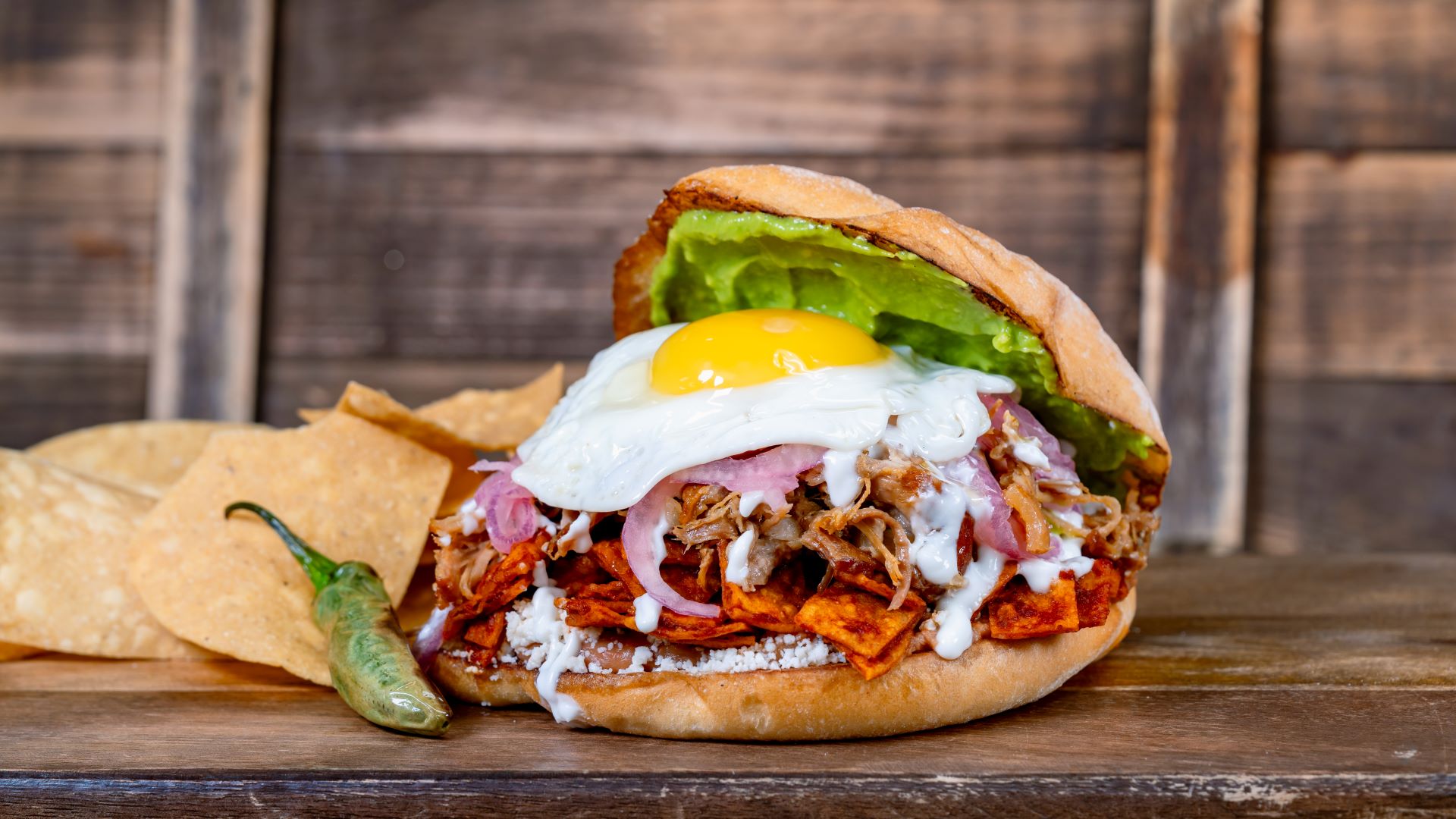 Chilaquiles Carnitas Torta at Paradise Garden Grill