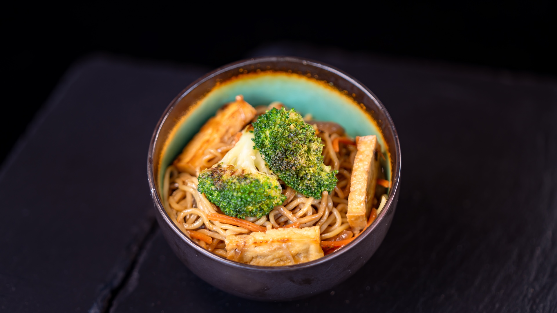 Disneyland Kids Meals Kids San Fransokyo Noodle Stir-fry: Fried tofu, broccoli, mushrooms, sesame oil, and soy sauce and small DASANI Water (plant-based)