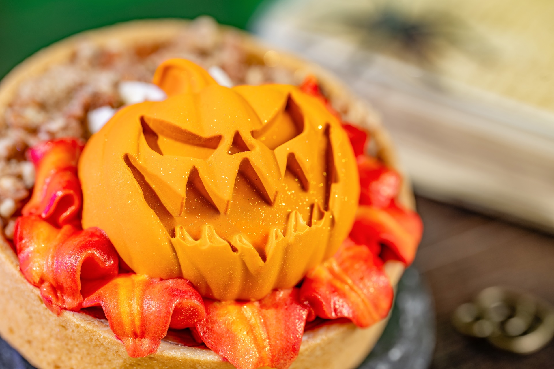 Headless Horseman Treat: Pumpkin pie tart topped with whipped cheesecake, spiced caramel panna cotta, candied pecans, and marshmallow buttercream “flames” (New) (Available during Mickey’s Not-So-Scary Halloween Party only)