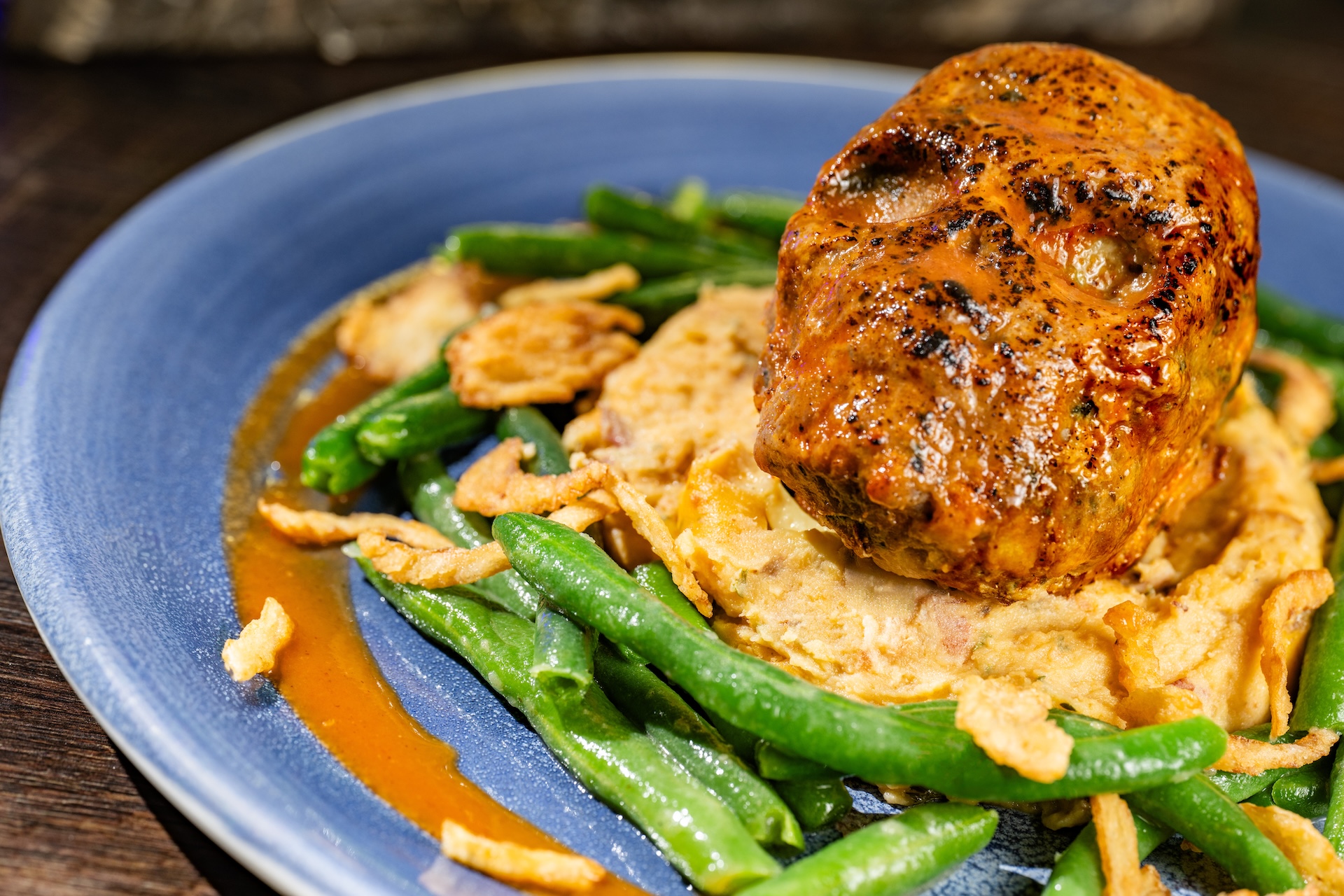 Skull Meatloaf: Caribbean-style glazed meatloaf served with loaded mashed potatoes and seasonal vegetables (Available during regular park hours and Mickey’s Not-So-Scary Halloween Party; reservations recommended)