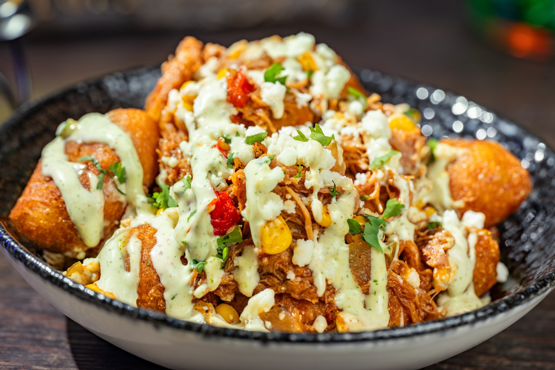 Chipotle Barbecue Pork and Street Corn Mini Corn Dogs: Mini corn dogs topped with fire-roasted corn, queso fresco, jalapeño ranch, and cilantro (Available during Mickey’s Not-So-Scary Halloween Party only)