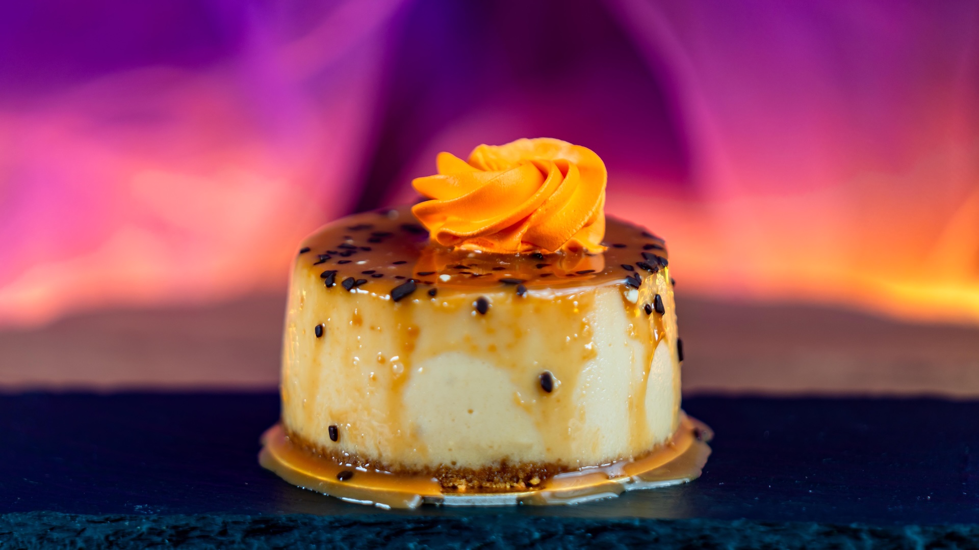 Caramel Apple Cheesecake: Caramel cheesecake with a caramelized apple filling topped with caramel drip, orange white chocolate mousse, and chocolate flakes (Available Aug. 18 through Nov. 12)