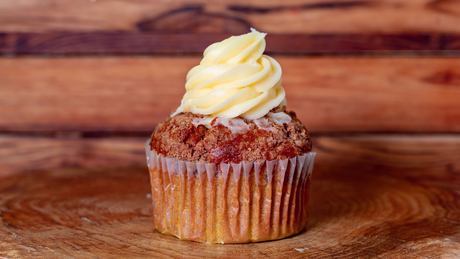 Pumpkin Muffin topped with cream cheese icing (Available Aug. 18 through Jan.6, 2027)