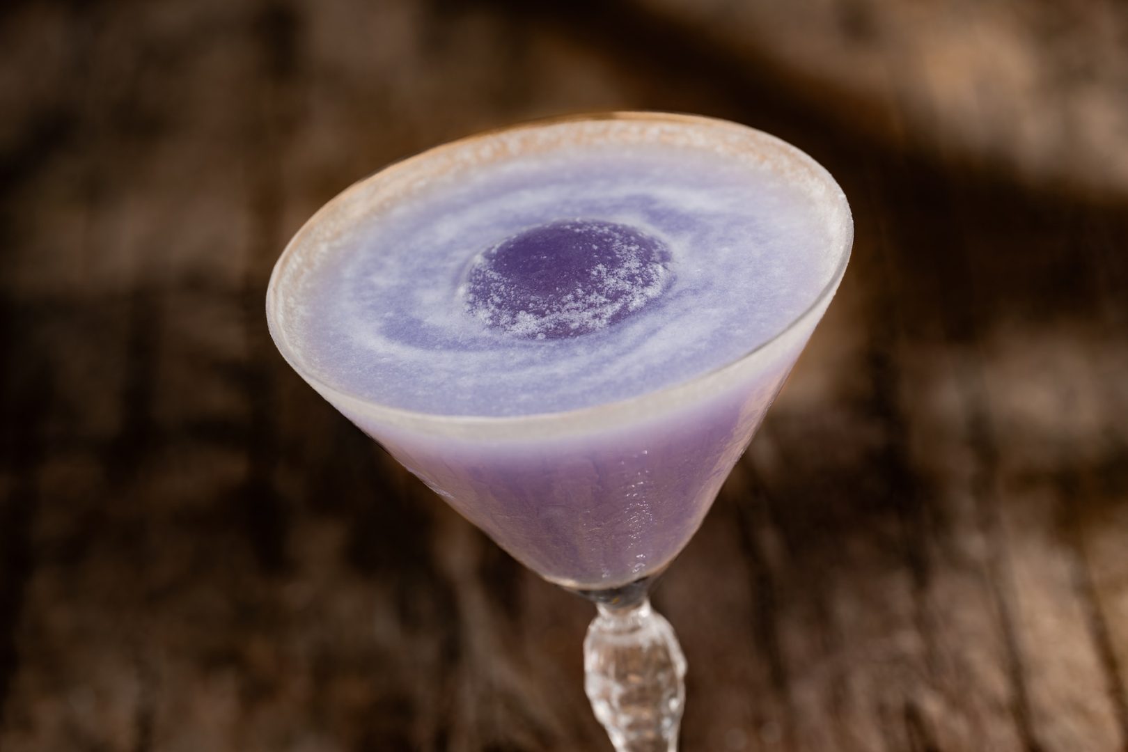 Midnight Relic: Tito’s Handmade Vodka, ube syrup, cream of coconut, lemon juice, and a pinch of edible glitter (New)