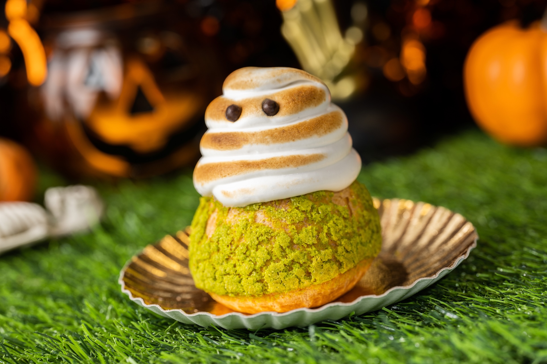 Ghost Cream Puff: Filled with sour apple custard topped with toasted meringue and chocolate crispy pearls 