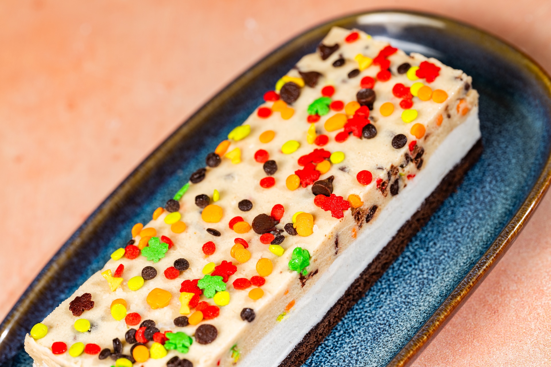 Fall Ice Cream Cookie Dough Sandwich: Vanilla ice cream, edible cookie dough, chocolate brownie, chocolate chips, fall sprinkles, and sea salt flakes (New) 