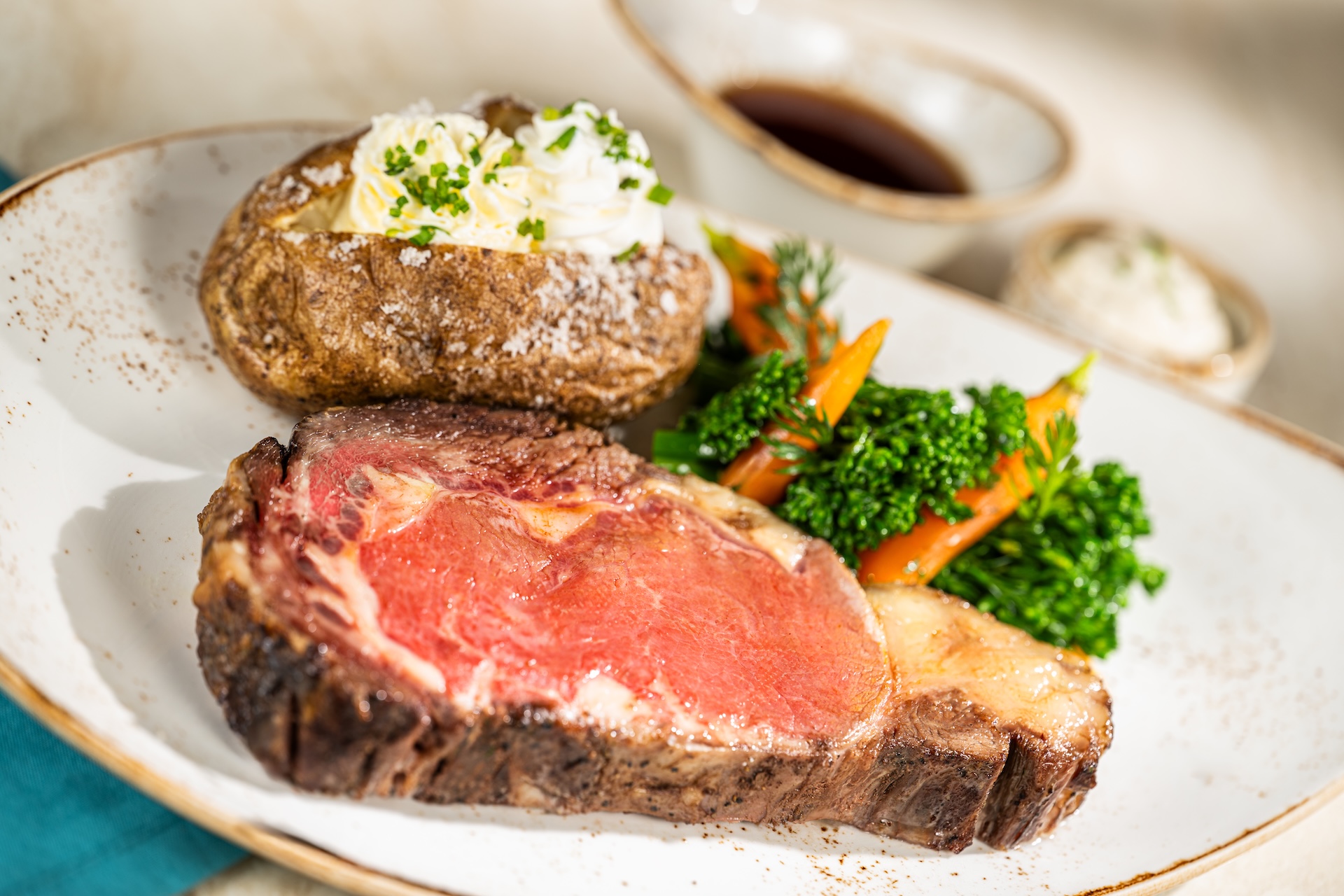 Photo of prime rib and baked potato
