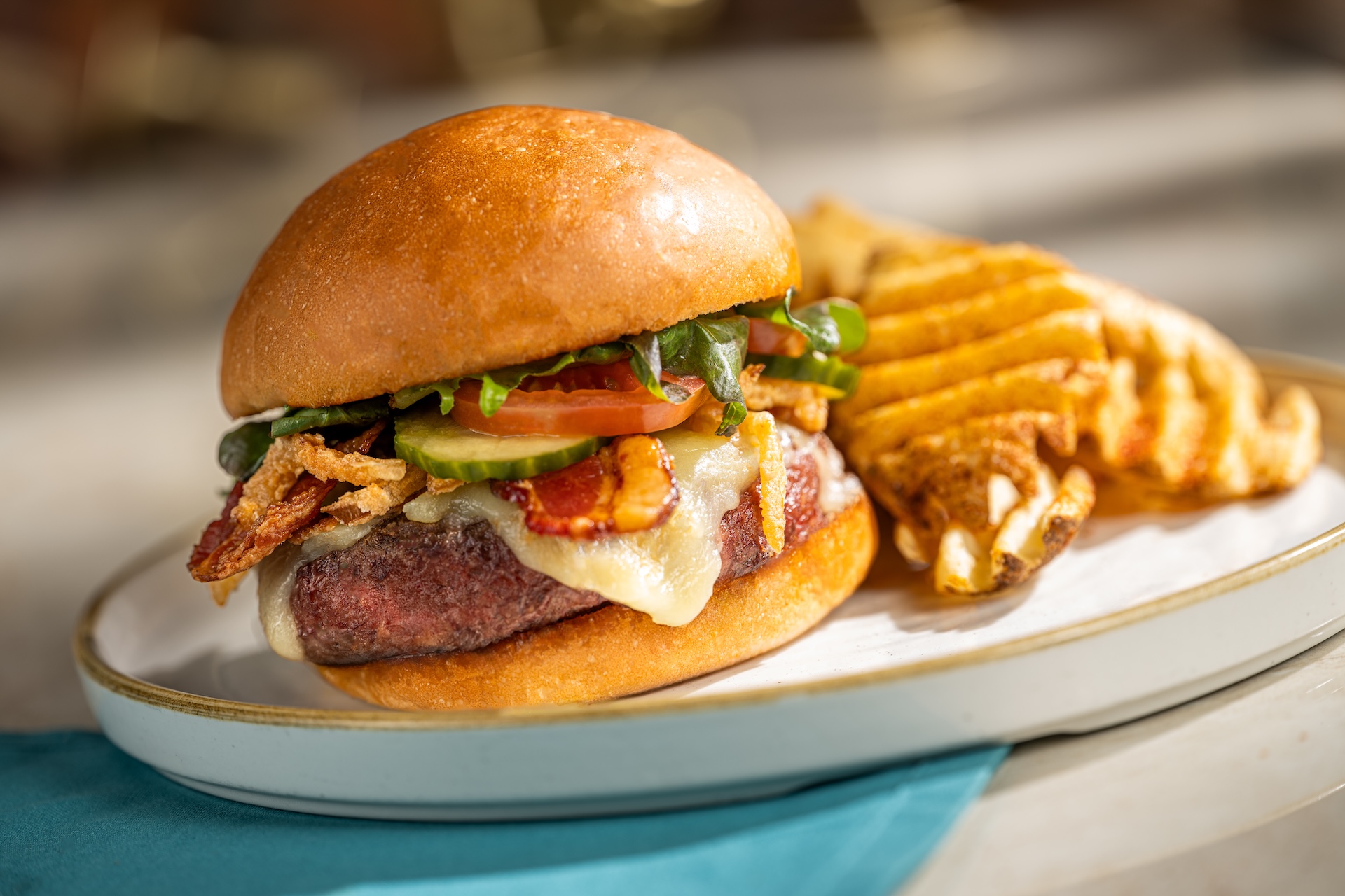 Photo of cheeseburger and fries
